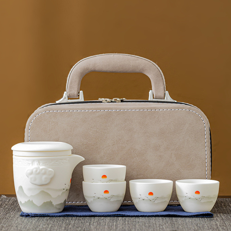 Bộ ấm trà du lịch một ấm bốn cốc gia dụng công ty hàng năm lưu niệm doanh nghiệp ấm trà gốm sứ bán buôn