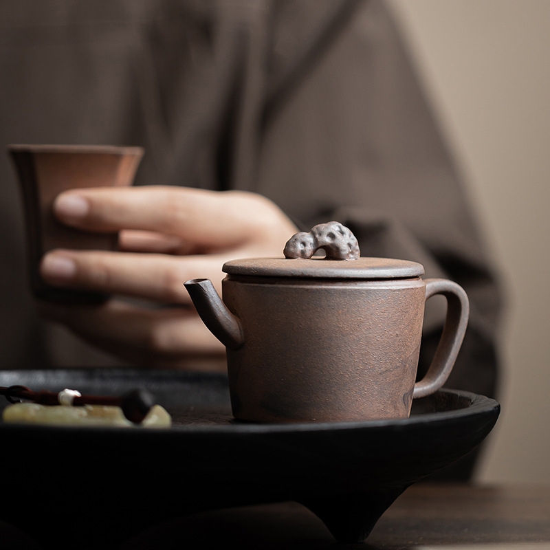 Ấm pha trà gốm sứ cổ điển Thái Hồ đá Han ấm pha trà bùn đá cũ quặng thô ấm trà lọc đơn ấm trà bộ trà Kung Fu
