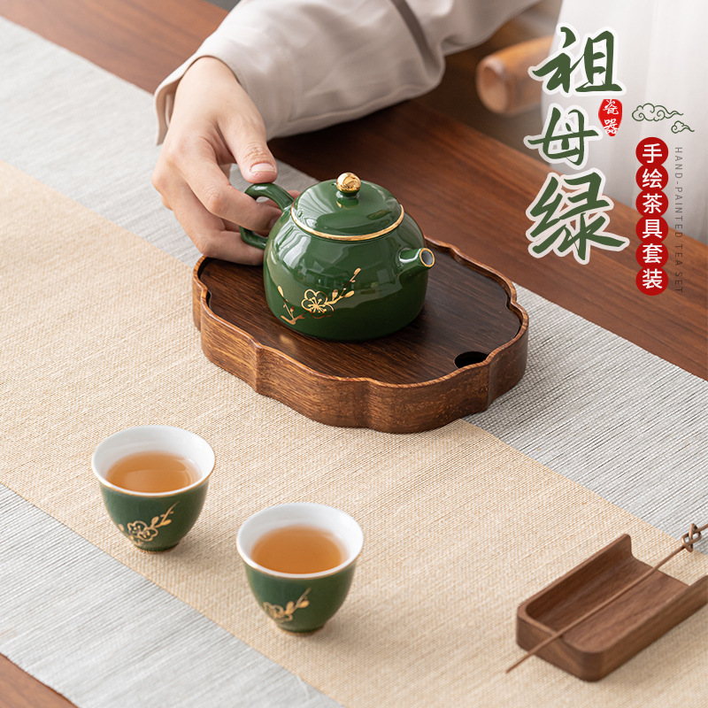 Bộ ấm trà gốm ngọc lục bảo Bộ ấm trà lọc đơn giản Bộ trà Kung Fu tráng men tráng men Bộ Một Ấm hai cốc hộp quà