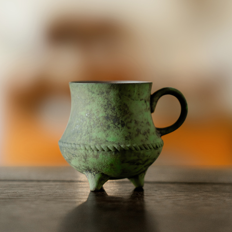Cốc ba chân màu xanh nhạt bùn đá cũ cốc trà gốm sứ cốc trà thủ công kiểu Trung Quốc có tay cầm cốc đơn chủ nhân