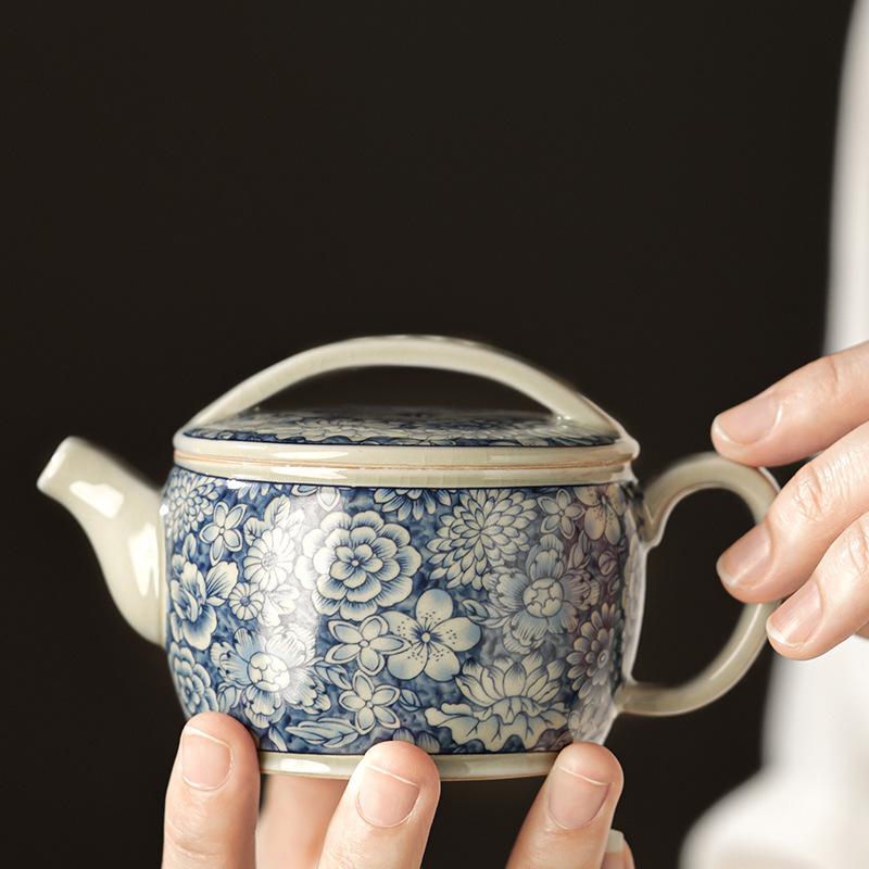 Câu chuyện đất sét Ấm trà Hanwa màu xanh và trắng gốm sứ gia dụng dụng phụ kiện ấm trà có thể nâng ấm trà