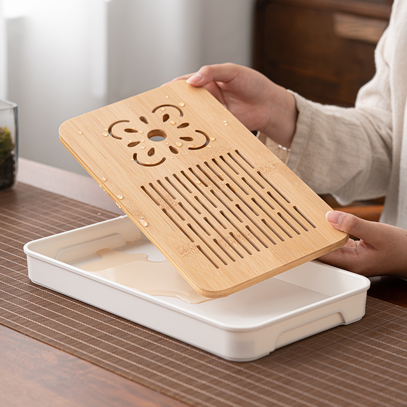 Bộ trà Kung Fu du lịch Nhật Bản bộ nhỏ ấm pha trà cao cấp gia dụng cốc trà gốm sứ khay trà ngoài trời túi xách tay