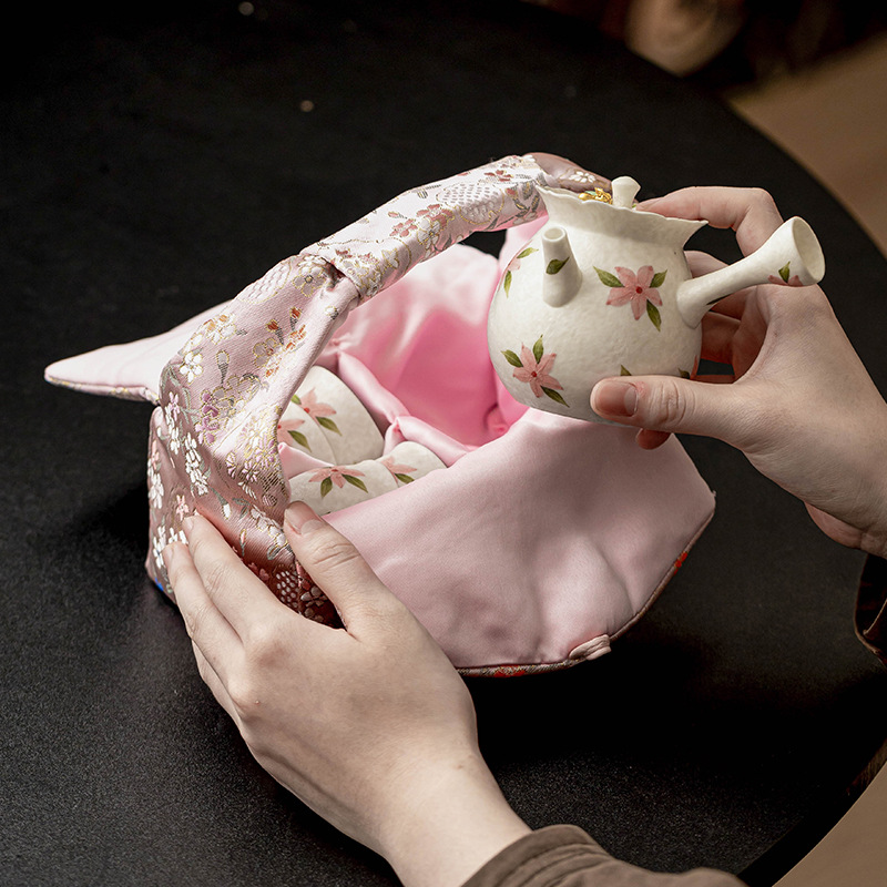 Bộ ấm trà tay cầm bên hoa anh đào mỏ đá Bộ ấm trà cầm tay ngoài trời Bộ ấm trà du lịch giá trị cao