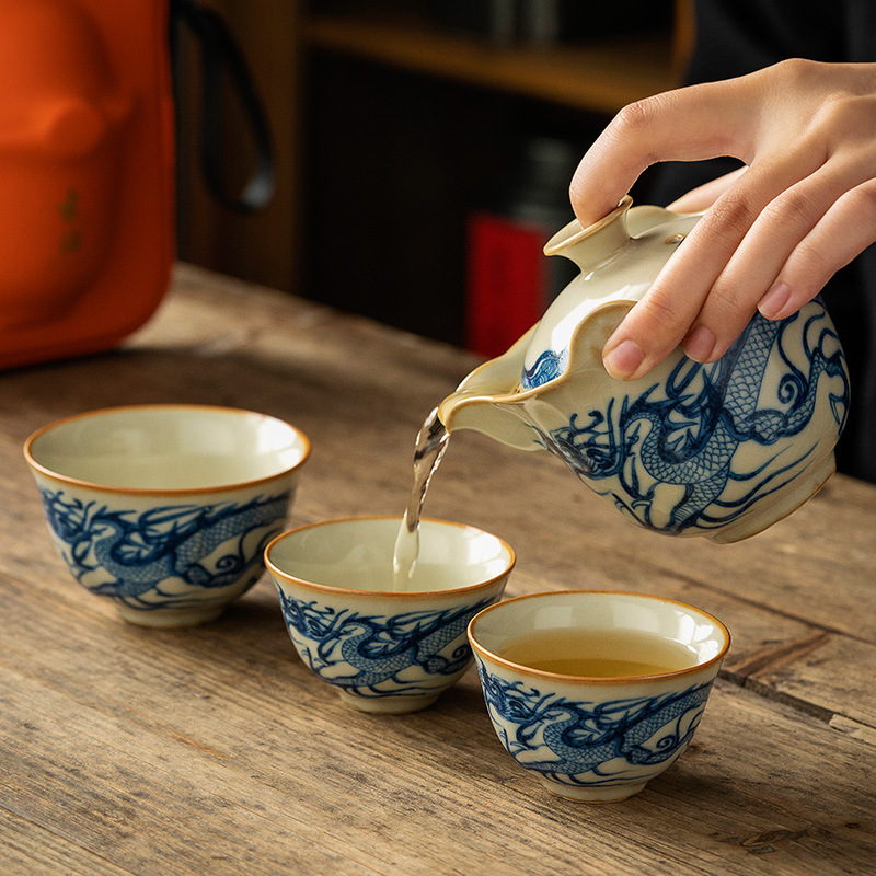 Ruyao Kuaike Cup Bộ trà du lịch Một ấm Ba cốc Bộ trà cắm trại ngoài trời Thiết bị uống trà gốm di động