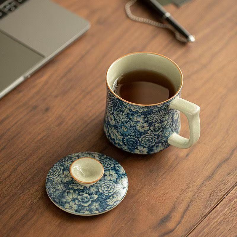 Cốc nước miễn phí màu xanh và trắng Wanhua giả Song Ru Kiln Cốc trà gốm sứ có nắp Cốc văn phòng Bộ trà cao cấp gia dụng Cốc pha trà