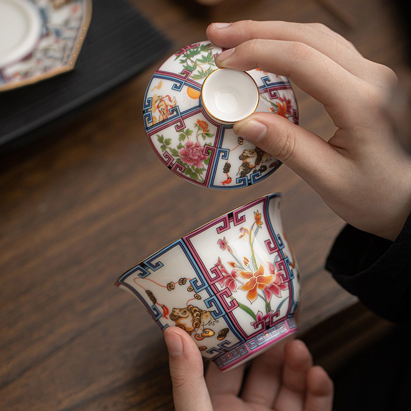 Đồ sứ trắng tráng men cao cấp Jucai Sancai có nắp bát Bộ trà Kung Fu Đồ sứ gia dụng không nóng bát trà bán buôn