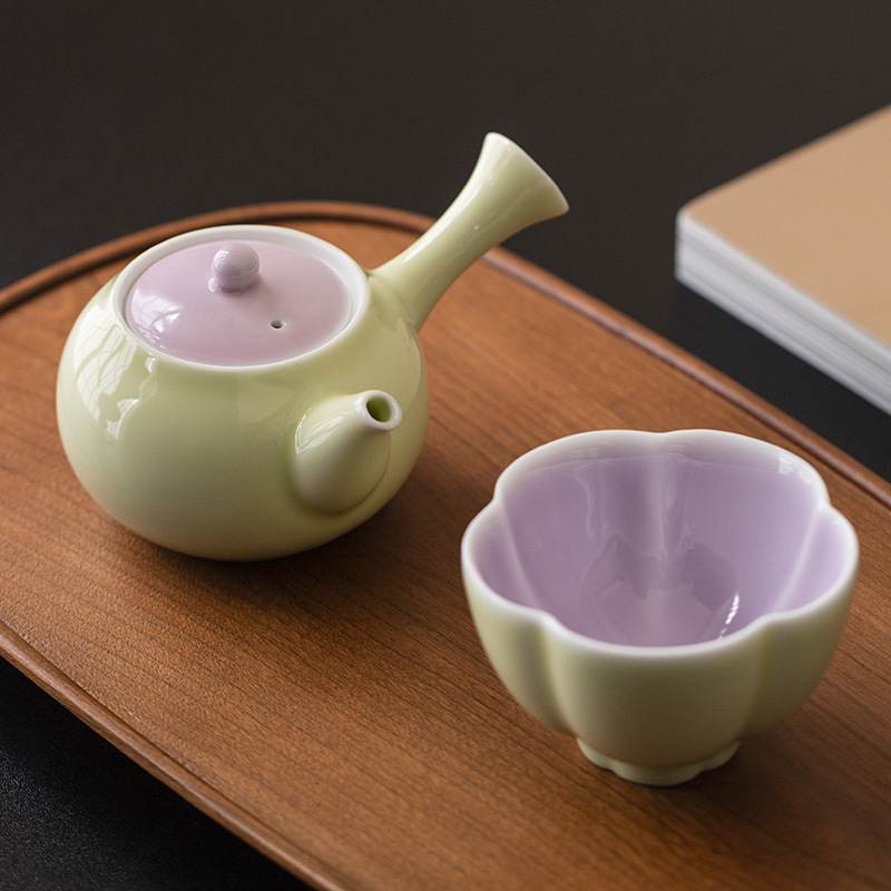 Ấm trà tay cầm bên gốm sứ tươi mới ấm trà ấm trà ấm trà ấm trà phòng trà cổ điển ấm trà tráng men màu Trung Quốc gia dụng
