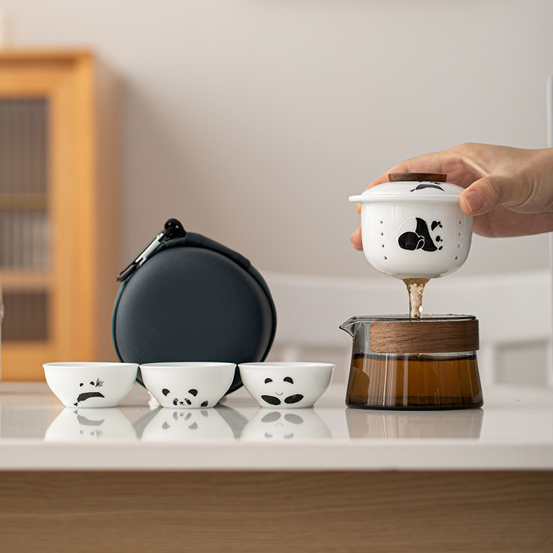 Bộ trà du lịch thủy tinh bộ nhỏ vẽ tay gấu trúc di động ngoài trời gốm sứ di động cốc khách nhanh một bình ba cốc