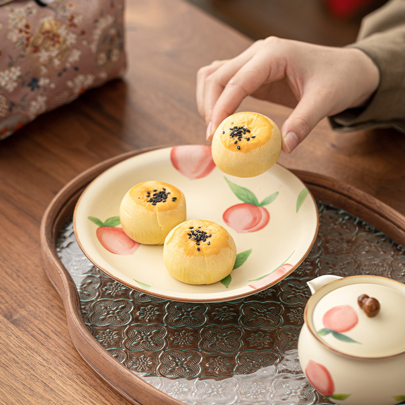 Màu hồng vẽ tay gốm sứ màu be nước đào nắm tay ấm chén cá nhân bộ trà Kung Fu bộ quà tặng bán buôn