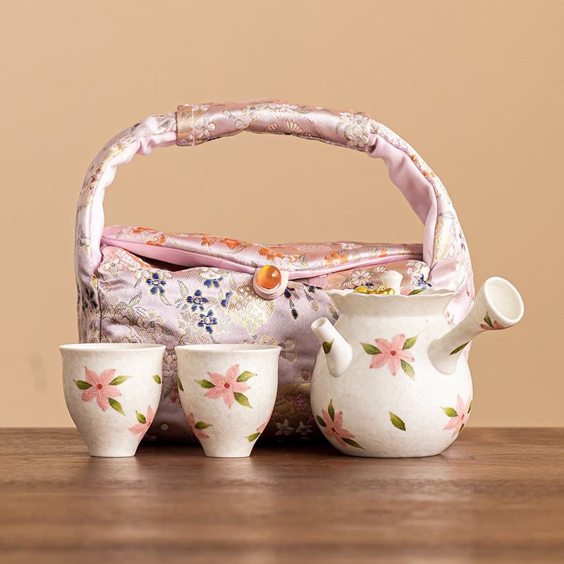 Bộ ấm trà tay cầm bên hoa anh đào mỏ đá Bộ ấm trà cầm tay ngoài trời Bộ ấm trà du lịch giá trị cao