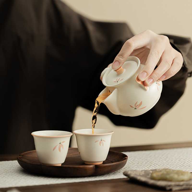 Chuông gió phong lan Ấm cầm tay đám mây tốt lành gốm sứ gia dụng dụng cụ pha trà Kung Fu Trung Quốc dụng cụ pha trà lọc tay không nóng