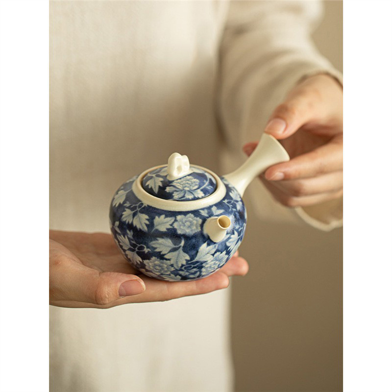 Ấm tay cầm bên đá Thái Hồ tráng men soda ấm trà màu xanh và trắng quốc gia gia dụng ấm trà đơn gốm sứ bộ trà Kung Fu