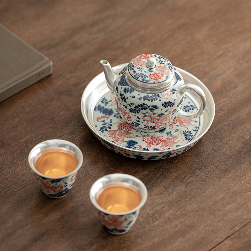 Bộ trà một ấm hai tách cá bạc chơi trong nước Bộ trà gốm sứ gia dụng Trung Quốc tặng quà doanh nghiệp cho người lớn tuổi
