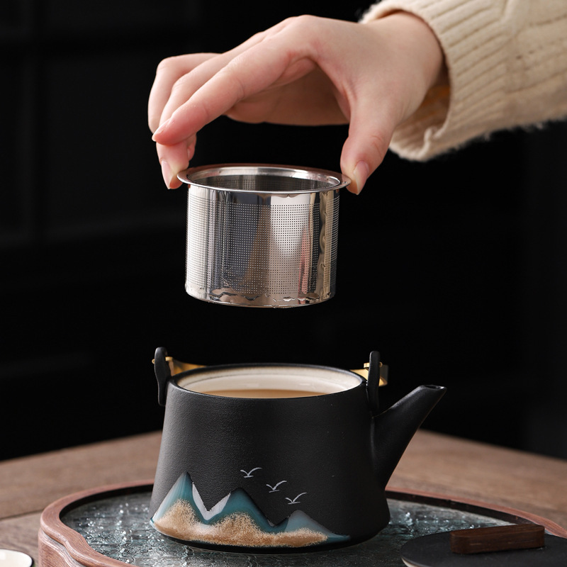 Bộ trà Kung Fu Thousand Miles Giang Sơn Bộ nhỏ gia dụng đơn giản sang trọng nhẹ xà nâng ấm chén trà gốm sứ bán buôn quà tặng