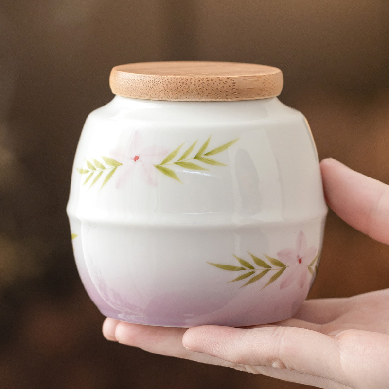 Vẽ tay thay đổi màu tím trà bình gốm sứ gia dụng bình kín trà nhỏ cầm tay phụ kiện bộ trà
