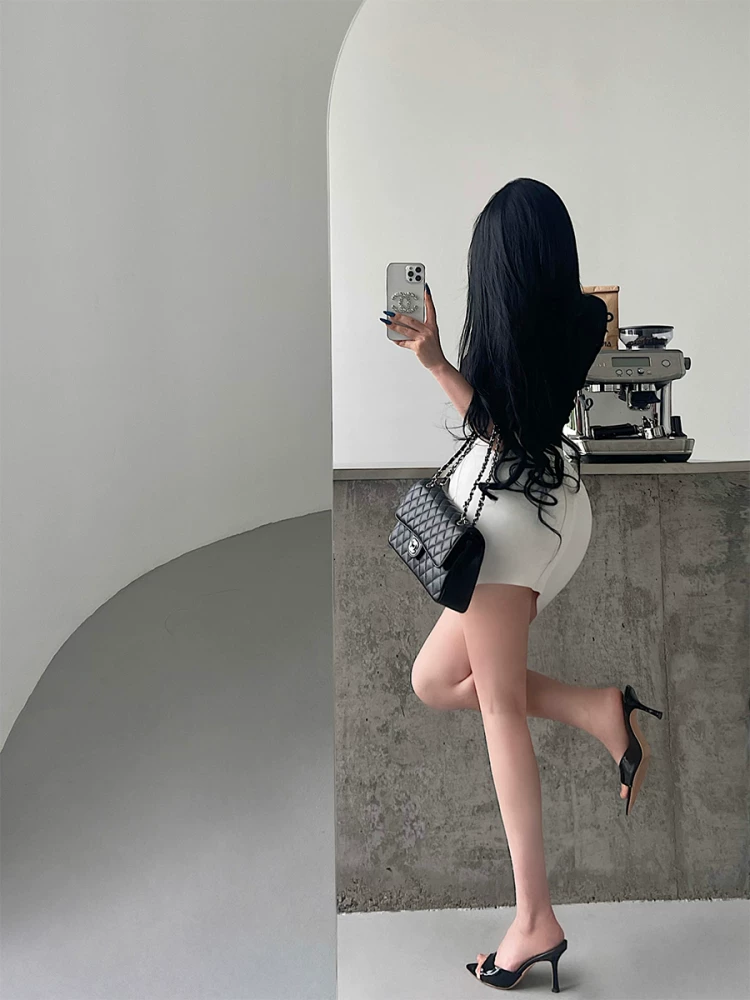 YoungGirlDay trưởng thành và gợi cảm OL váy ngắn ôm sát eo cao có dây thun chéo giúp thon gọn cơ thể.