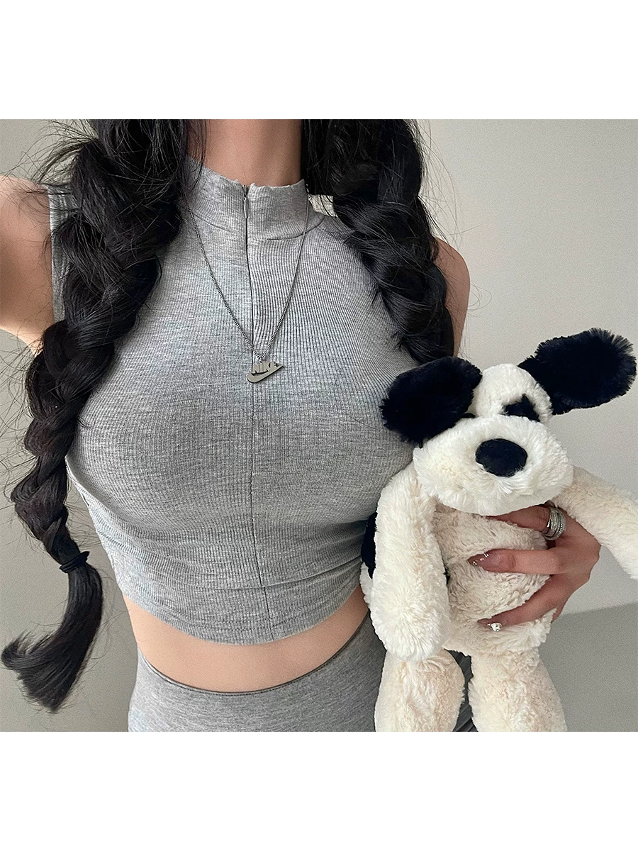 Áo crop top ngắn tay sát nách, kiểu dáng ôm sát, có dây kéo, cổ trụ, eo xếp ly, phong cách hot girl gợi cảm YoungGirlDay.