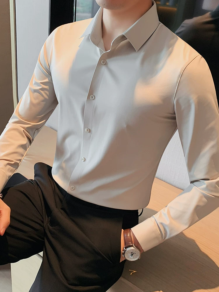 Áo sơ mi nam dài tay liền mạch co giãn cao, trang phục công sở trang trọng, lịch sự, màu trơn cao cấp, không cần là ủi, kiểu dáng ôm sát.