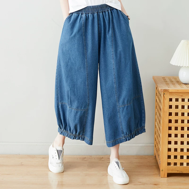 Quần jean nữ size lớn, kiểu dáng suông rộng, cạp cao, phong cách nghệ thuật, giúp thon gọn, mẫu mới hè 2026.