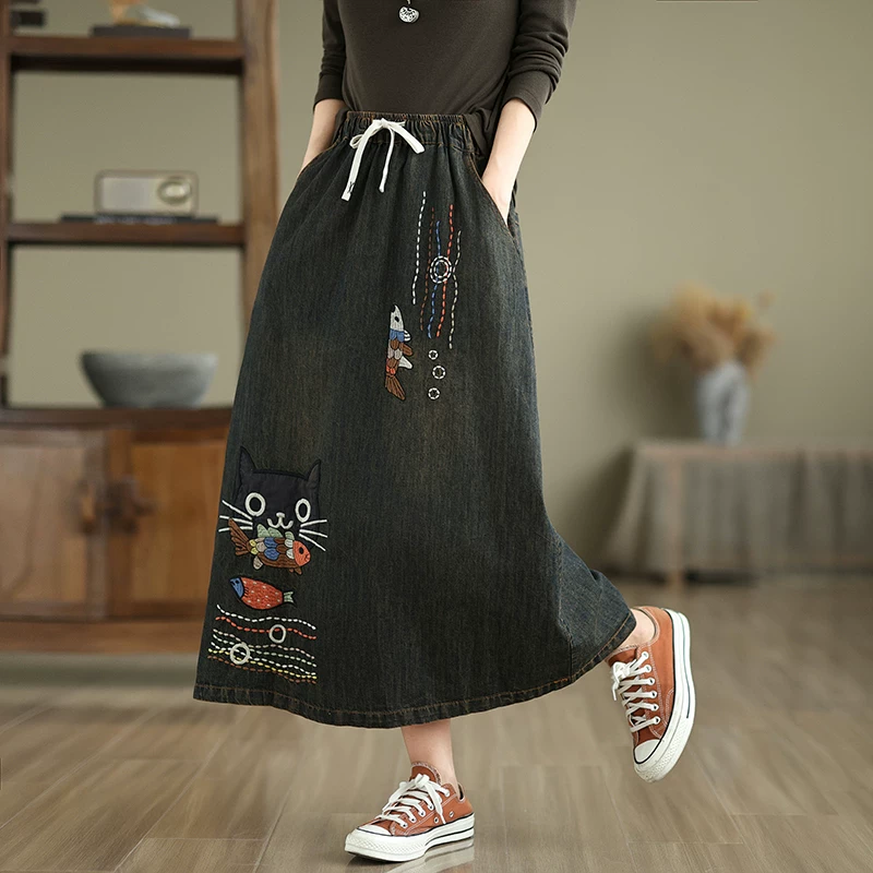 Váy denim thêu hình động vật hoạt hình cổ điển, kiểu dáng mỏng cho mùa xuân hè, cạp cao co giãn, phối màu cổ điển, váy dài vừa phải giúp thon gọn vóc dáng.
