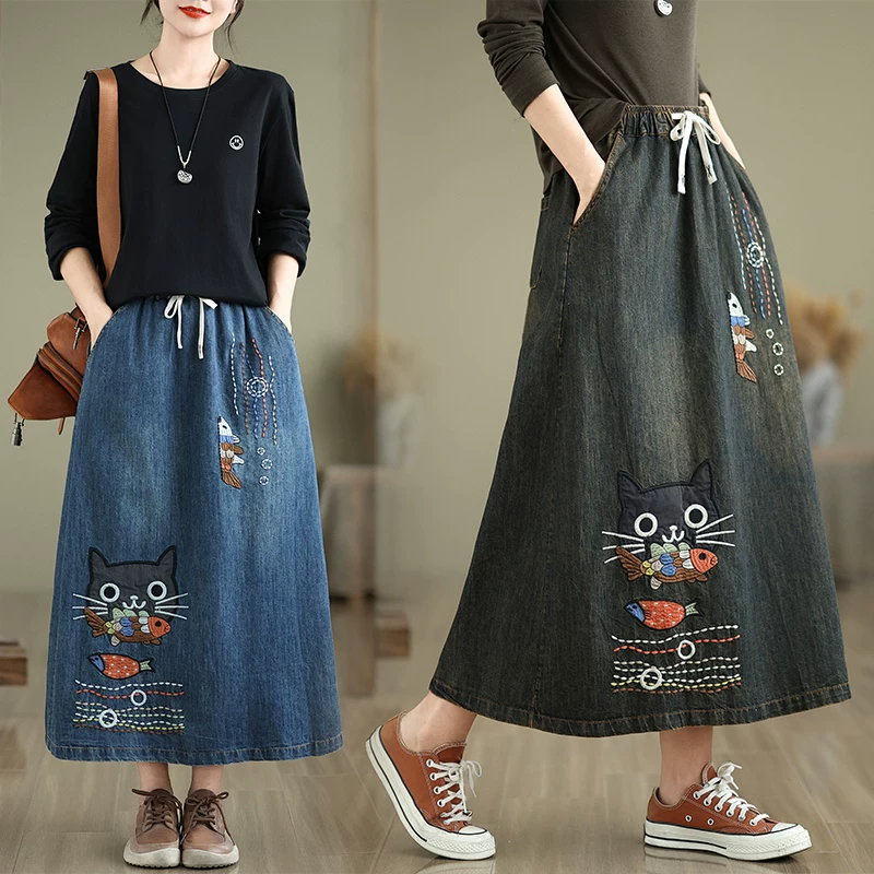 Váy denim thêu hình động vật hoạt hình cổ điển, kiểu dáng mỏng cho mùa xuân hè, cạp cao co giãn, phối màu cổ điển, váy dài vừa phải giúp thon gọn vóc dáng.