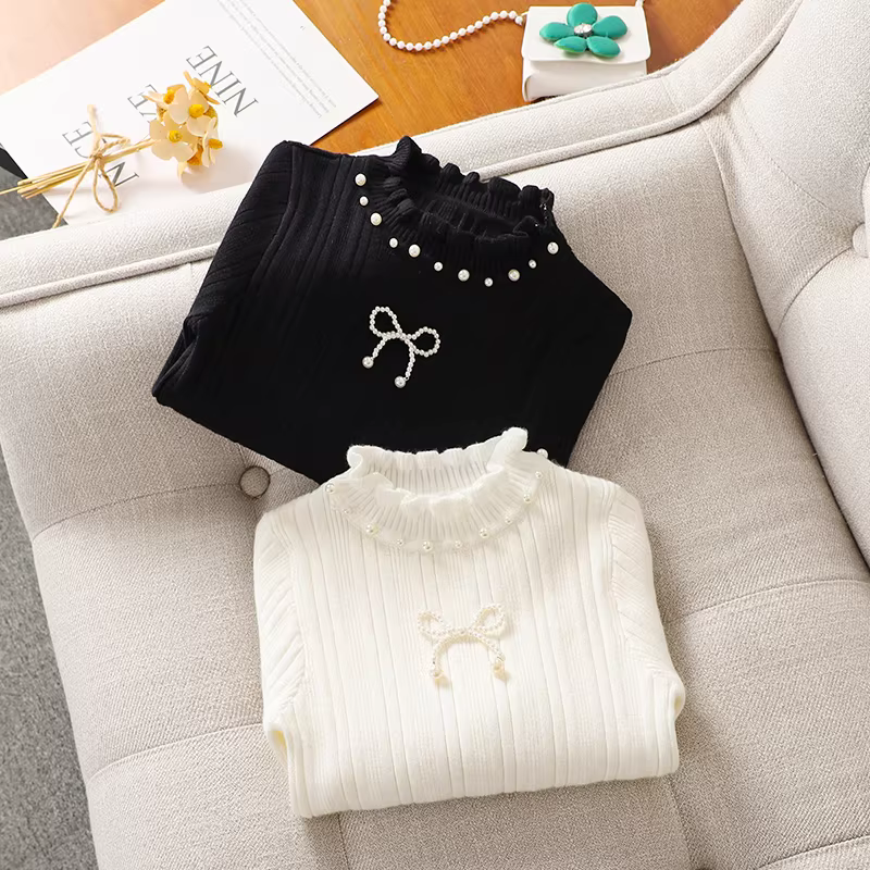 Áo len bé gái thu đông 2025, áo lót lông cừu trẻ em kiểu mới, áo len cổ lọ bèo nhún nửa cao, quần áo mùa đông