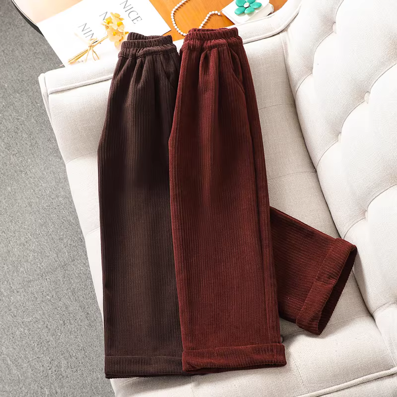 Quần lót nỉ có lót lông cừu cho bé gái 2025 phong cách mới thu đông tích hợp lông cừu dày dặn quần ống rộng quần dài mùa đông quần dài cho bé gái