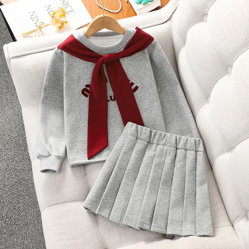 Bộ đồ phong cách preppy cho nữ sinh mùa xuân thu 2025, áo len dệt kim mới, chân váy xếp ly, trang phục mùa xuân kiểu JK cho nữ sinh