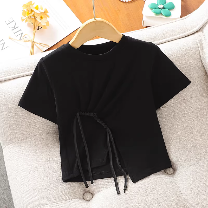 Áo thun bé gái mùa hè 2025 kiểu mới, áo thun ngắn tay xẻ tà chất cotton nguyên chất màu trắng dành cho bé gái lớn