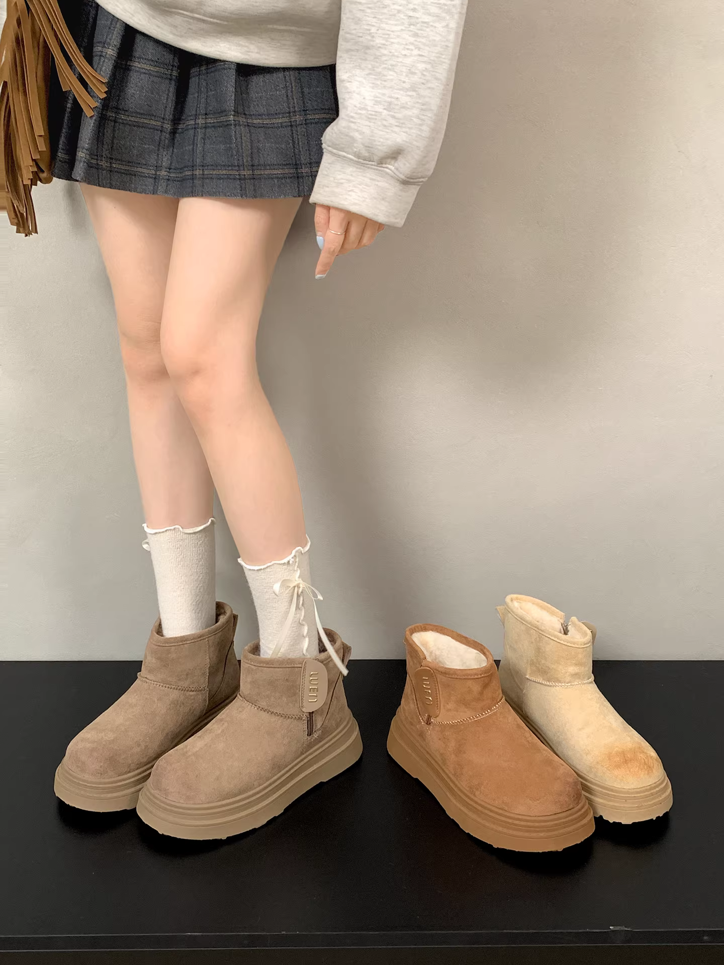 Giày bốt nữ đế dày lót lông cừu, đế chống trơn, mẫu mới mùa đông 2025, đa năng và ấm áp.
