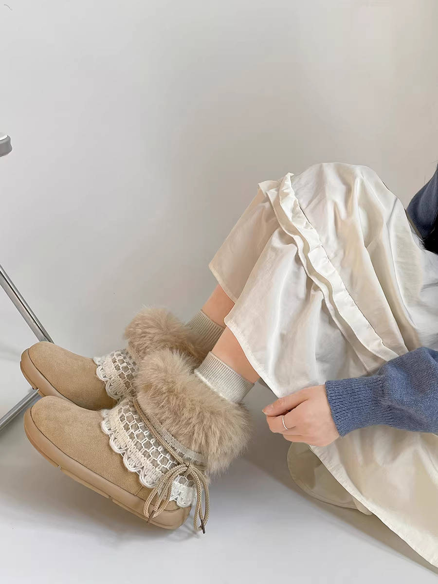 Giày bốt nữ đế dày lót lông cừu giữ ấm, giày mùa đông 2025 mới chống trơn trượt, lót bông dày dặn.