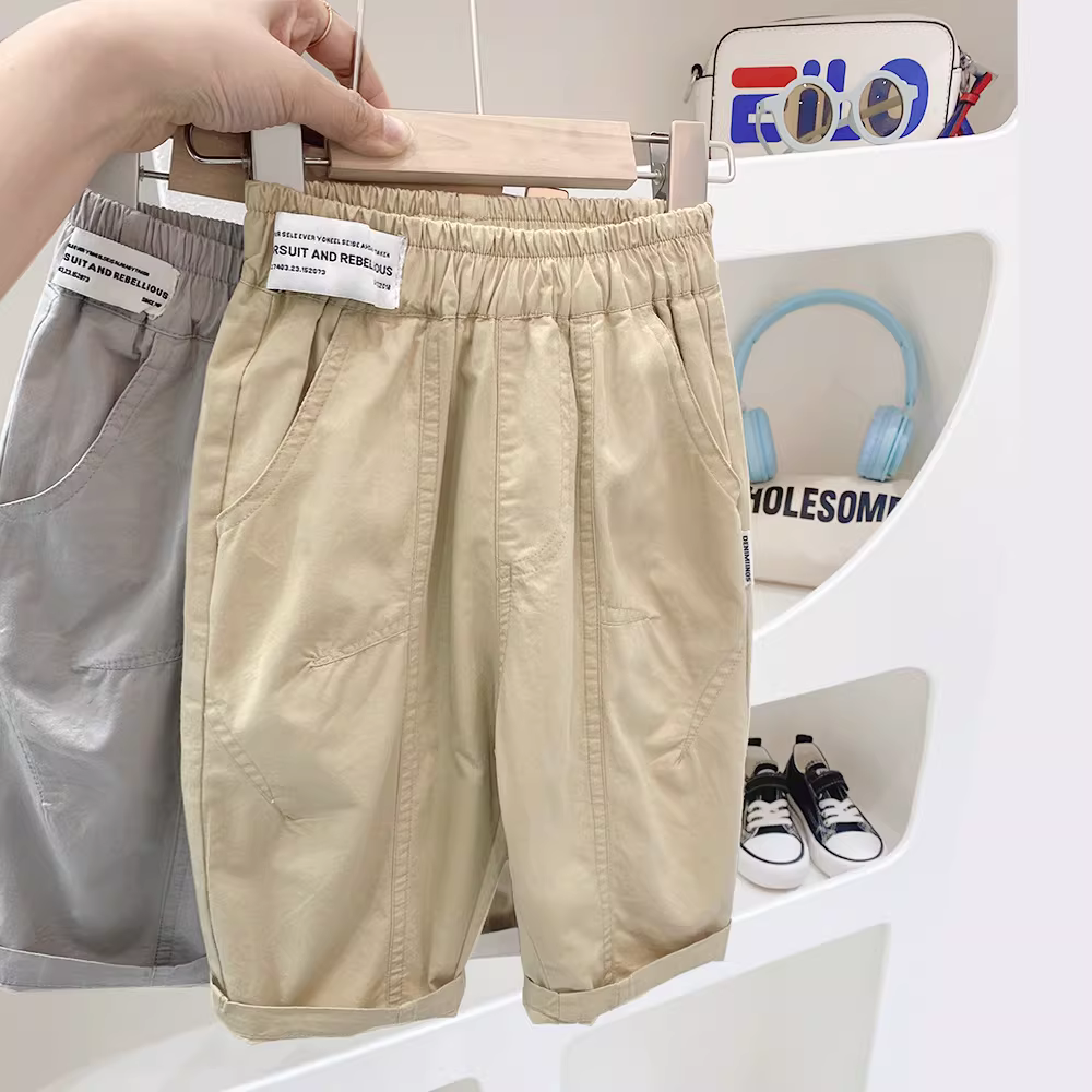 Quần trẻ em quần cargo bé trai hè 2025 mặc ngoài trời quần capri bé trai mặc thường ngày quần dài trung bình dệt cho bé trai