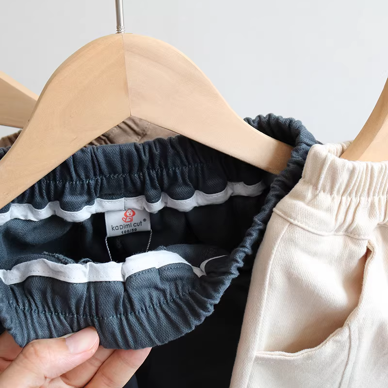 Quần dài trẻ em mùa xuân 2025 phong cách Hàn Quốc, quần dài phối màu giặt mài cho bé gái mùa xuân thu thời trang