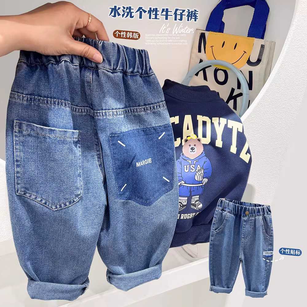 Quần jean trẻ em phong cách mới mùa xuân cho bé màu trơn mùa xuân thu hợp thời trang đa năng quần dài phong cách Hàn Quốc