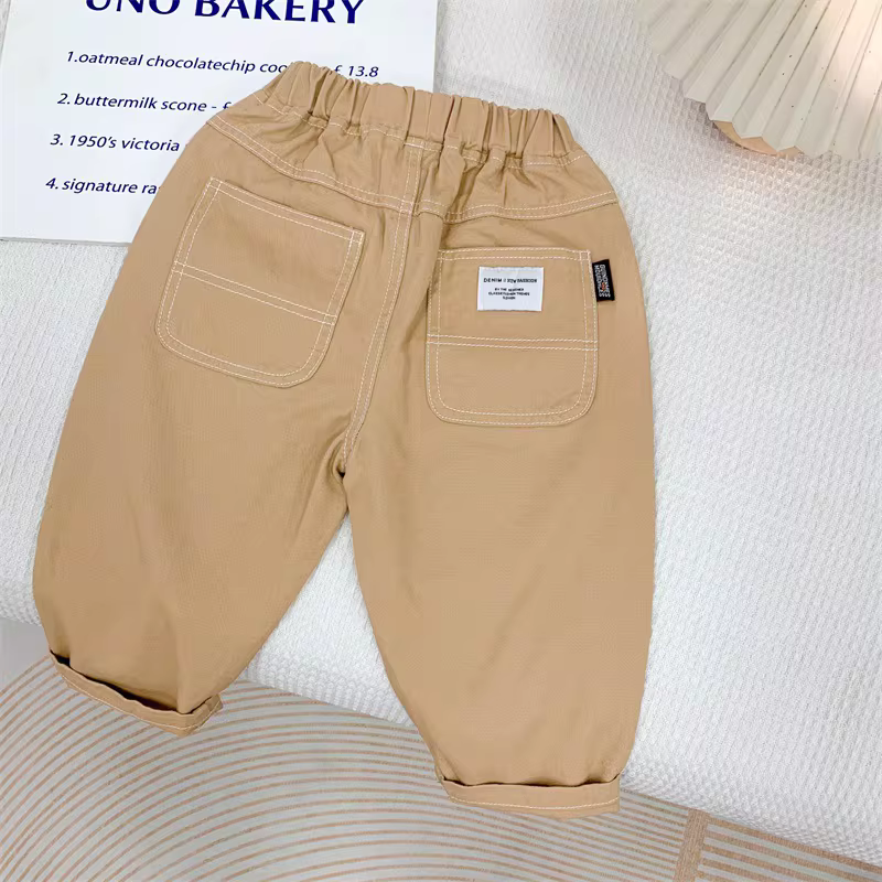 Quần thể thao bé trai mùa xuân 2025 lưng thun trơn màu dệt kiểu Hàn Quốc thời trang rộng rãi