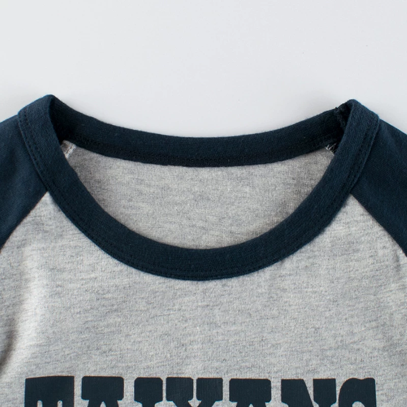 Áo thun dài tay bé trai tay raglan, kiểu xuân thu mới, áo lót cotton nguyên chất cho trẻ em, trang phục bên trong hợp thời trang cho trẻ nhỏ.