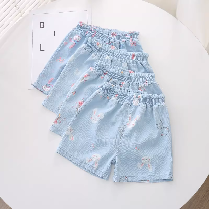 Quần short denim Tencel trẻ em hè 2025 kiểu mới in họa tiết toàn thân, quần short thường ngày cho bé gái và trẻ mới biết đi, kiểu dáng mỏng nhẹ