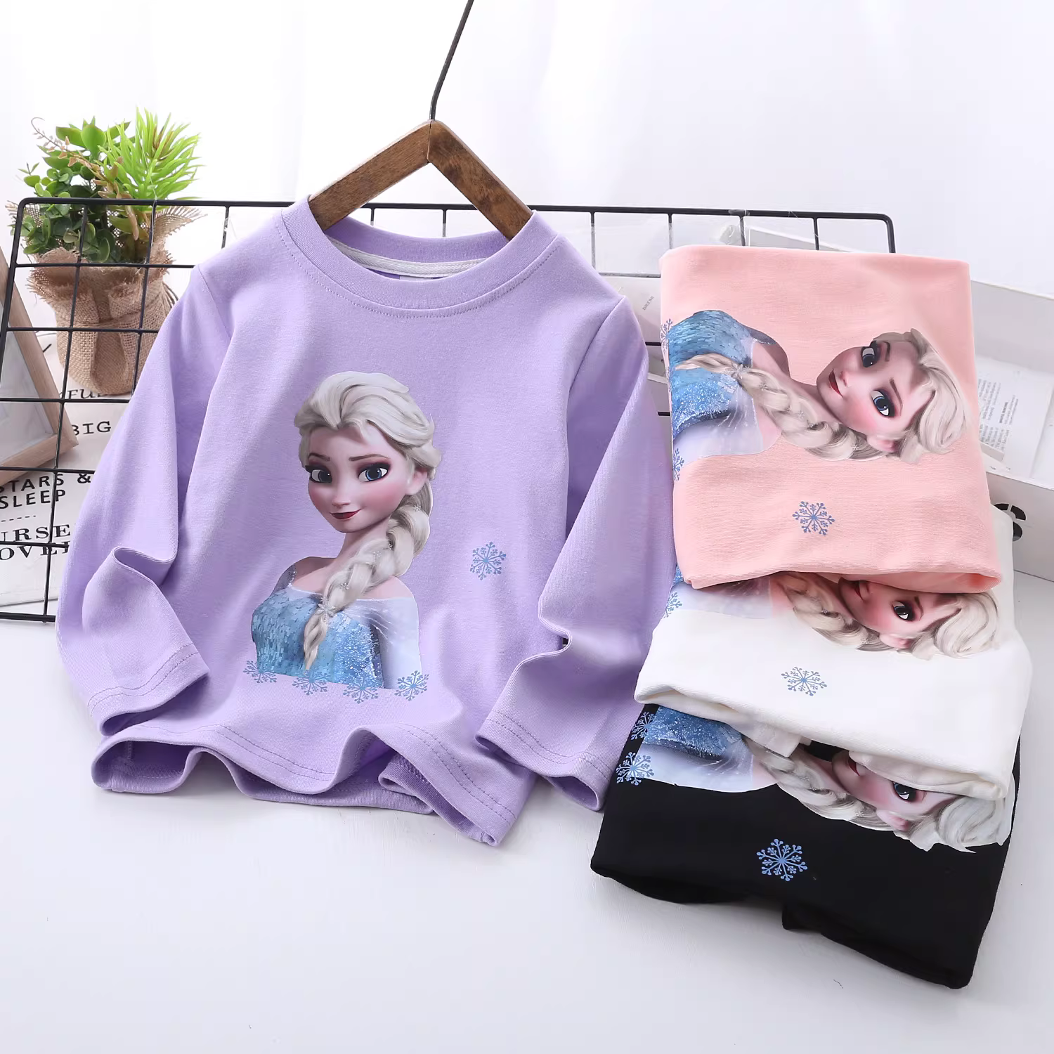 Áo thun dài tay bé gái mùa xuân mỏng cổ tròn quần áo trẻ em 2025 quần áo mùa thu trẻ em áo sơ mi cơ bản sành điệu áo thun in hình trẻ em hợp thời trang