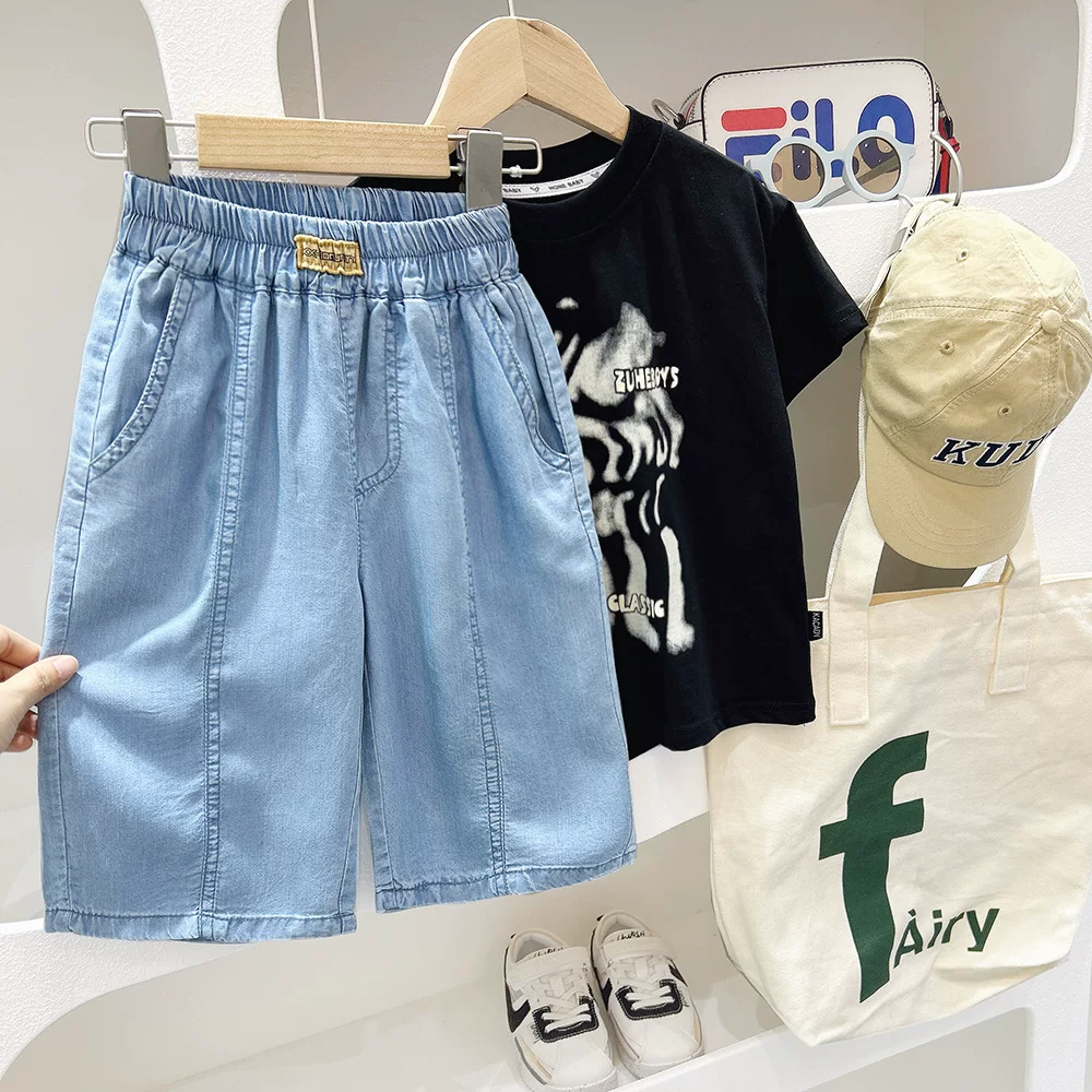 Quần short denim bé trai hè 2025, quần short năm phần chất liệu mỏng, kiểu dáng thường ngày cho trẻ lớn, quần ống rộng thoải mái cho trẻ em, kiểu dáng thời thượng