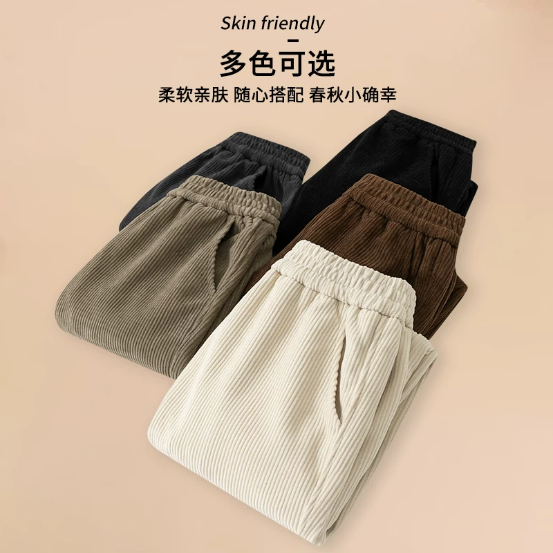 Quần dài bé gái xuân thu kiểu mới quần nhung kẻ cho trẻ lớn hơn quần thể thao trẻ em sành điệu quần thể thao trẻ em hợp thời trang