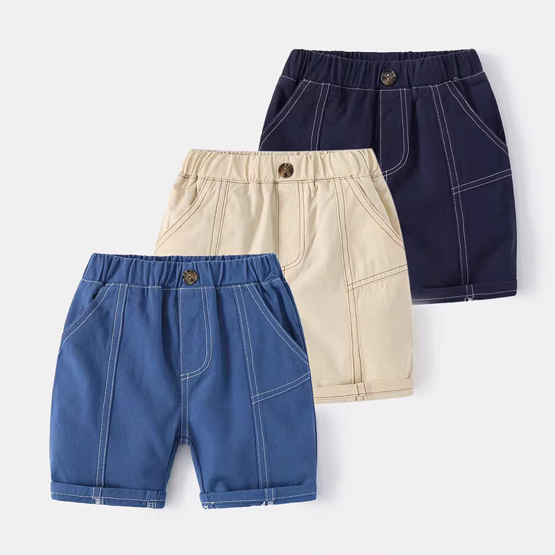 Quần short bé trai kiểu mới 2025, quần mùa hè trẻ em dài đến đầu gối, quần bé trai màu trơn ôm dáng, quần áo ngoài thời trang