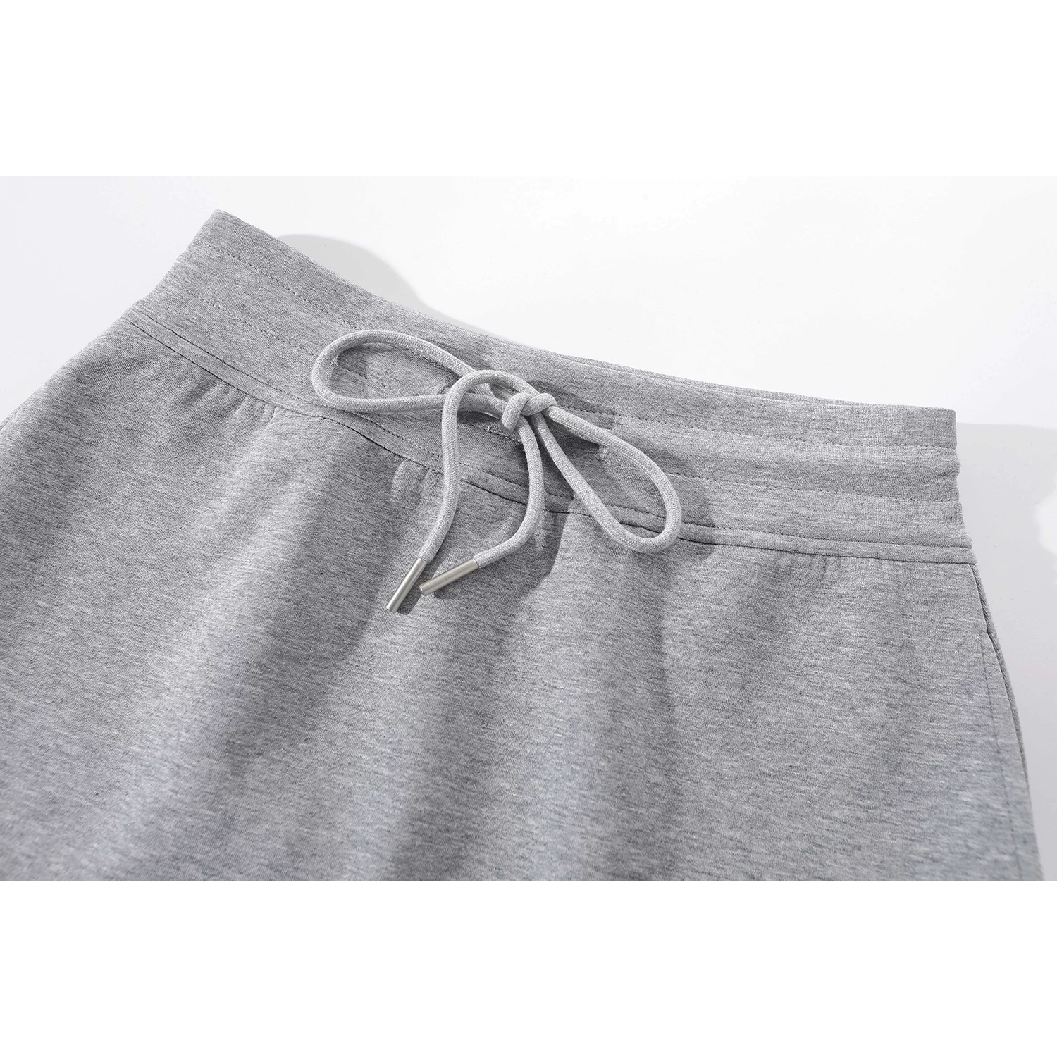 Váy eo thun có dây rút màu xám giảm tuổi theo phong cách Hàn Quốc dành cho nữ, váy bodycon cạp cao thể thao mùa xuân.