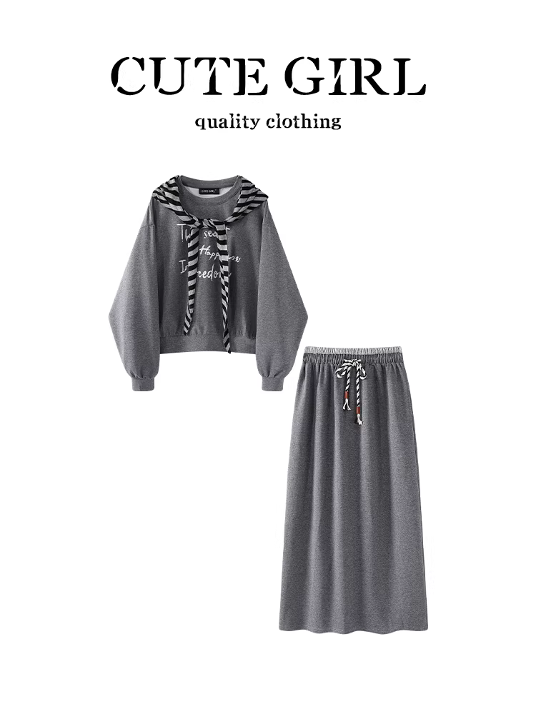 CuteGirl trông rất xinh trong bộ trang phục đầu thu này: một chiếc áo len in họa tiết màu xám với khăn choàng và một bộ váy cạp cao.