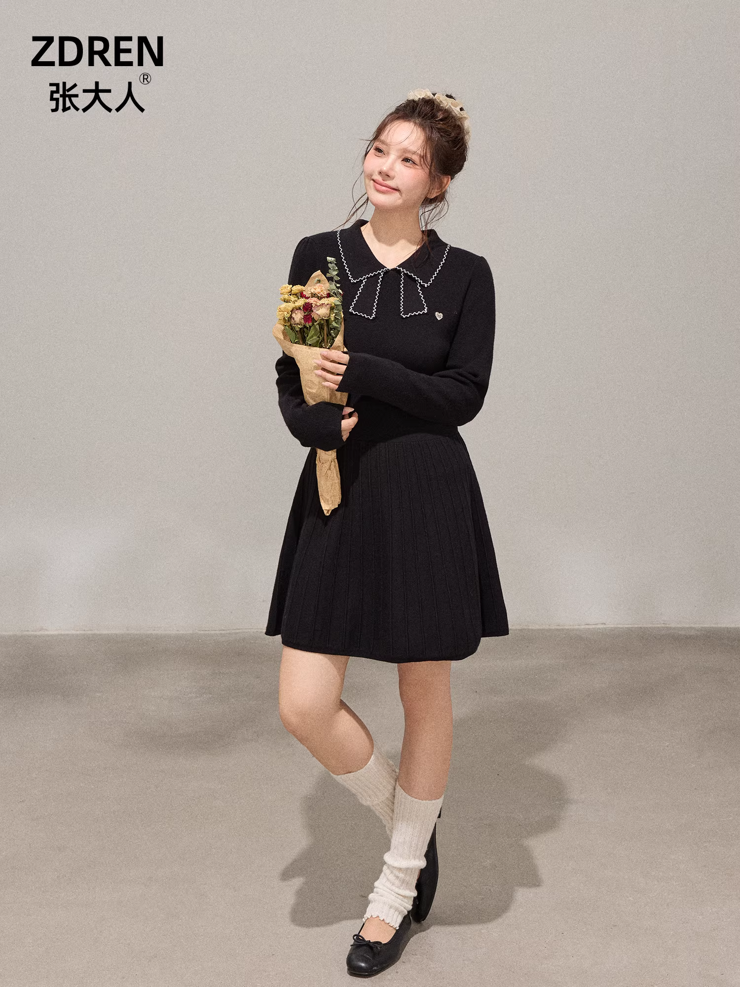 Quần áo nữ cỡ lớn dành cho những cô nàng hơi mũm mĩm, váy đen nhỏ dệt kim giảm béo mùa đông phong cách Hàn Quốc, váy thanh lịch lưng cao.