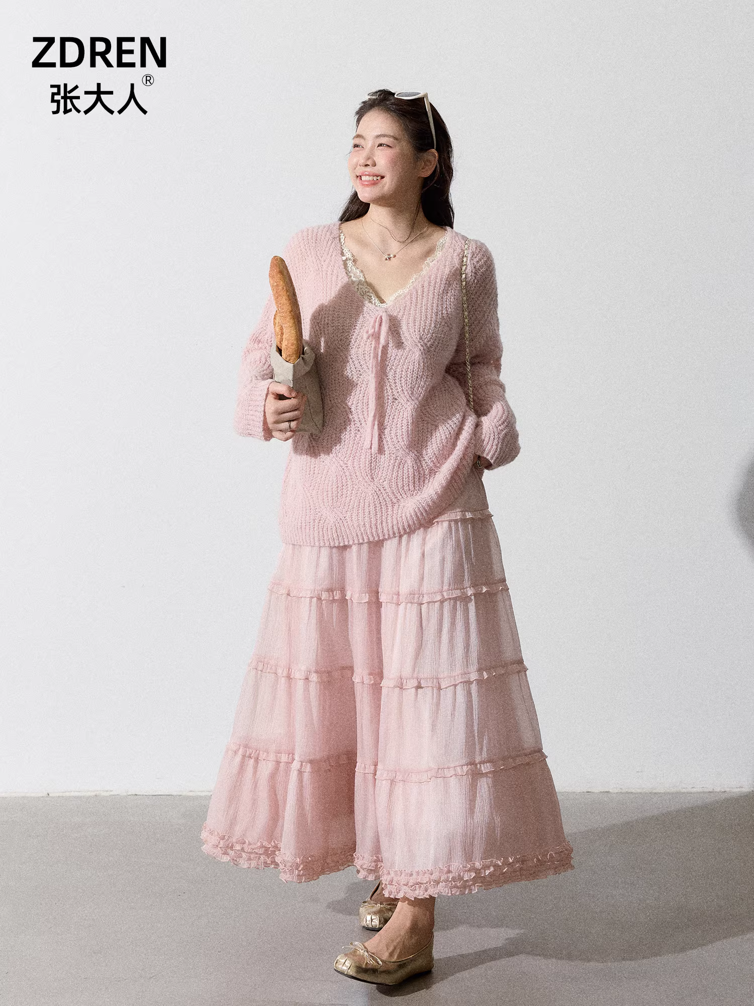 Quần áo nữ cỡ lớn dành cho người lớn, bộ giảm béo mùa thu dành cho các cô gái mũm mĩm, áo dệt kim màu hồng thanh lịch và chân váy chữ A.