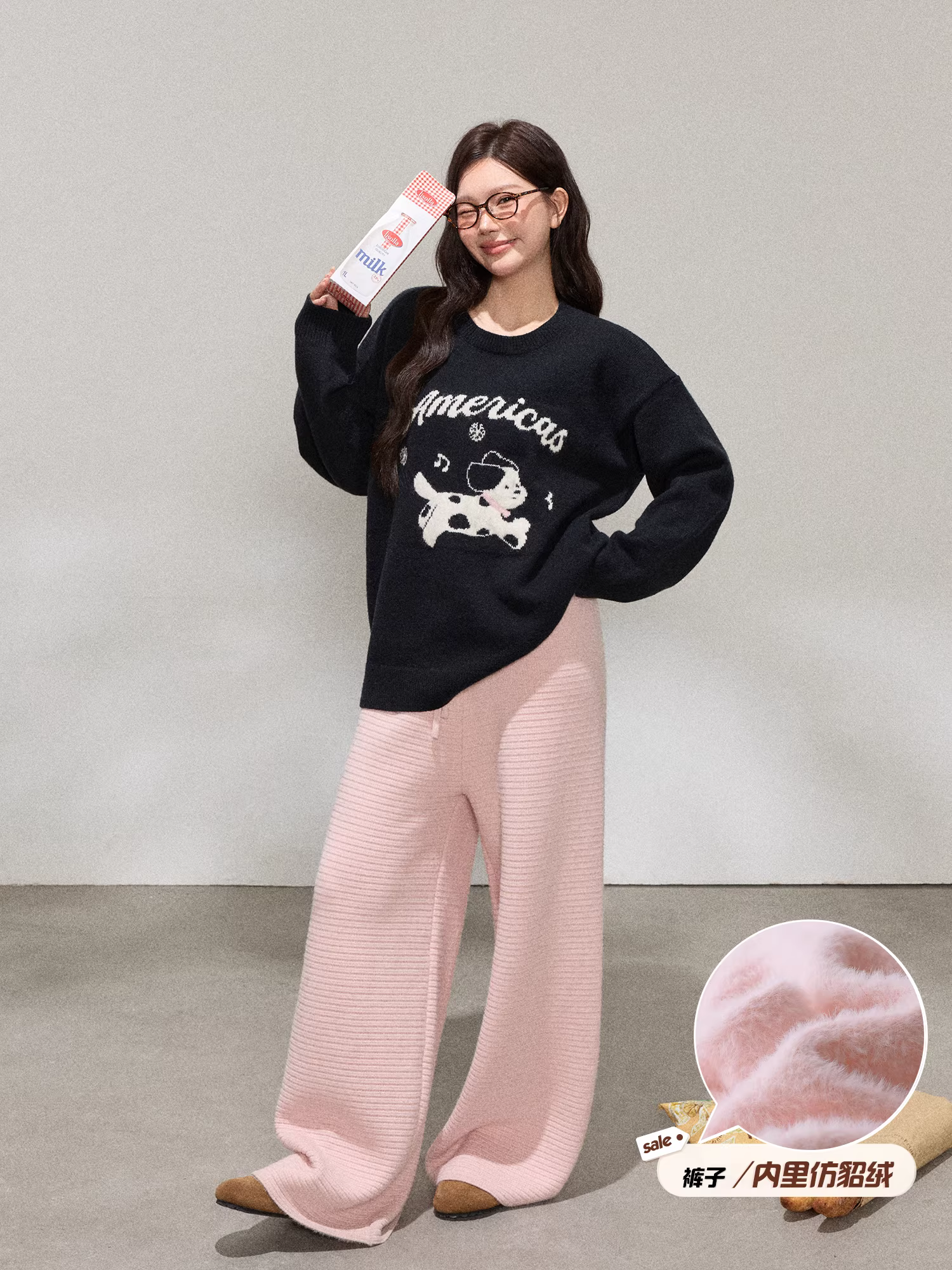 Bộ quần áo nữ cỡ lớn dành cho người lớn, kiểu dáng Hàn Quốc, áo len đen cổ tròn dáng rộng tôn dáng và quần âu lưng cao.