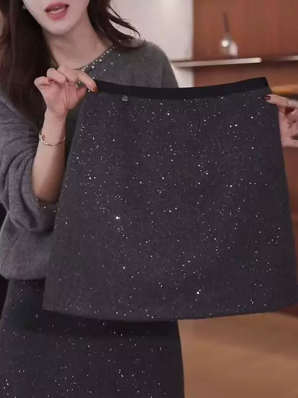 Váy len sequin bóng mượt cỡ lớn dành cho mùa thu đông, che phủ toàn thân và trông thon gọn, váy ôm hông, váy ngắn lưng cao chữ A đa năng.