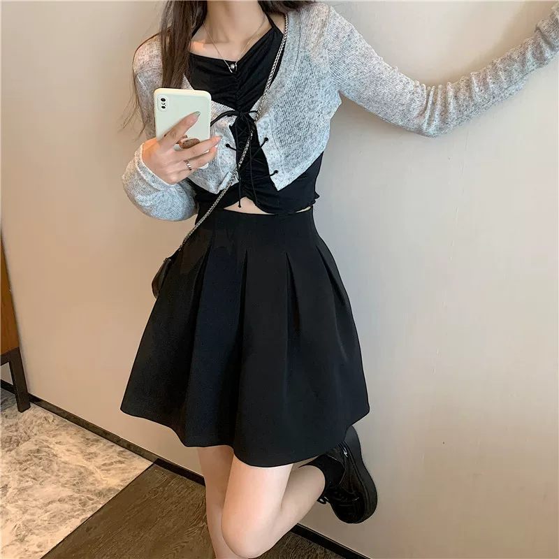 Váy xếp ly cỡ lớn váy tutu màu đen váy ngắn dành cho phụ nữ béo mm váy chữ A eo cao váy ô che hông váy giảm béo