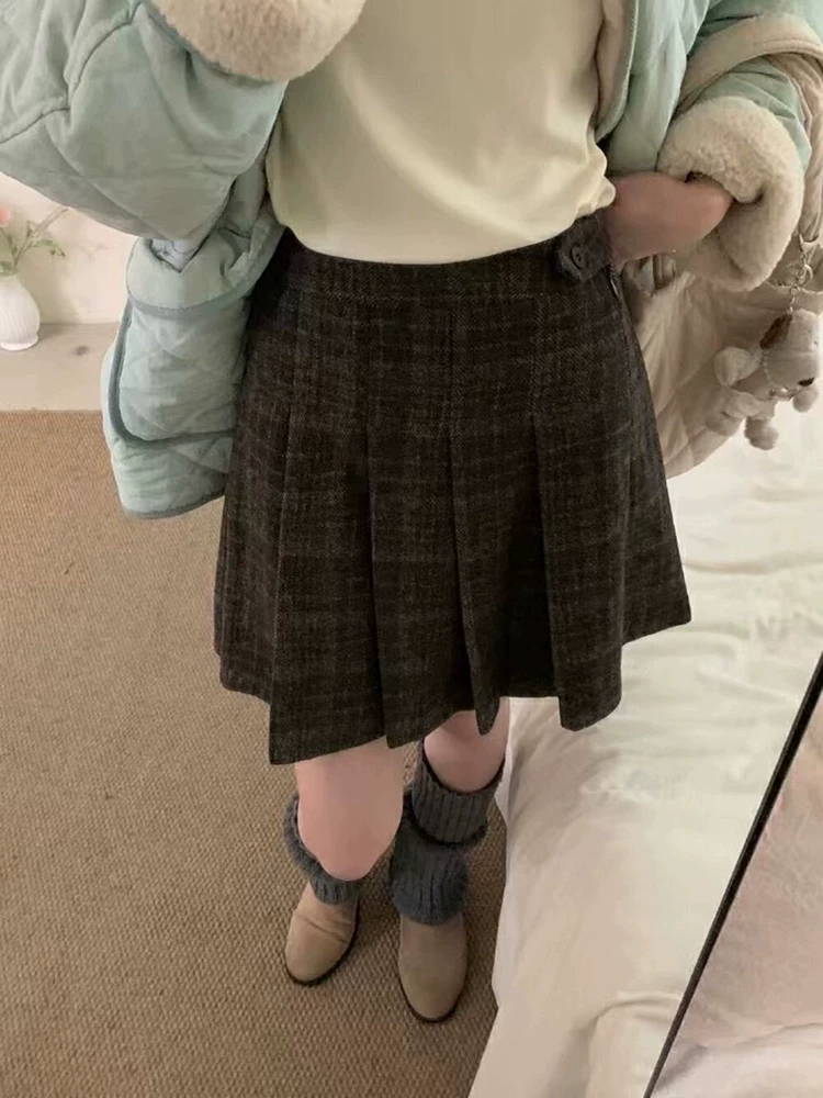 Váy len kẻ sọc nâu cỡ lớn dành cho nữ, mùa thu đông, váy chữ A cạp cao, tôn dáng, váy ngắn phong cách preppy.