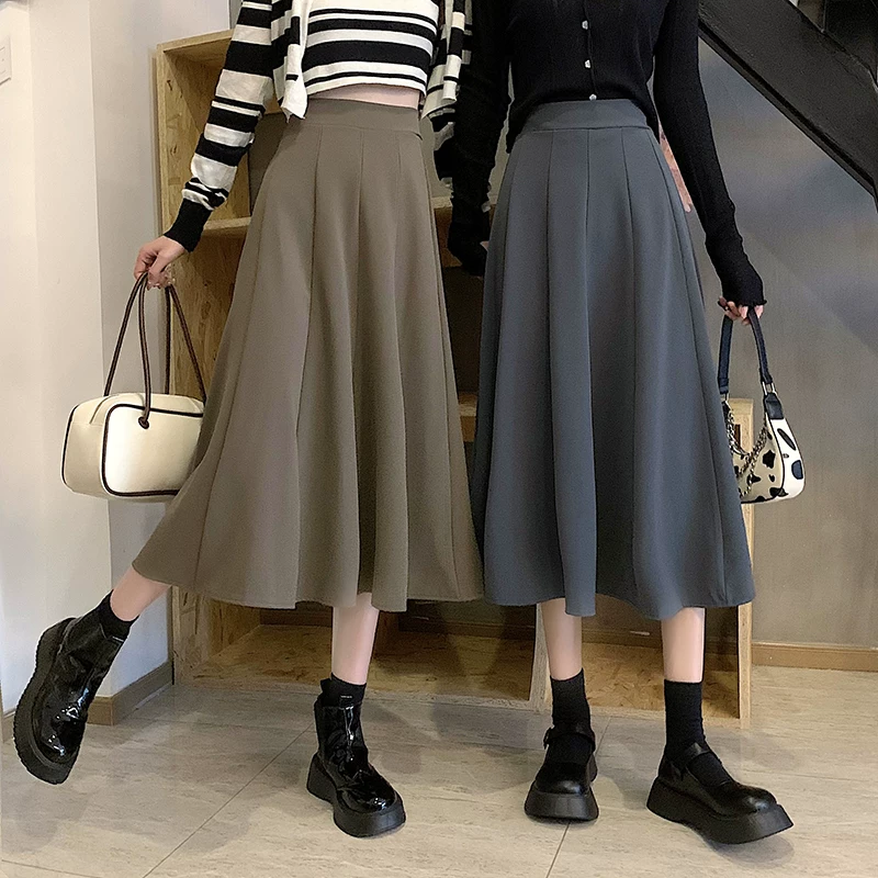 Váy dài vừa che hông cỡ lớn dành cho nữ, váy dù lưng cao thu đông 2023, váy nửa thân, váy chữ A siêu thịnh hành, váy xòe thon gọn.